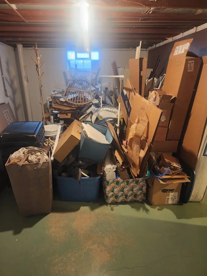 Roll-off dumpster container at job site for Concrete Dumpster Rental in North Haven